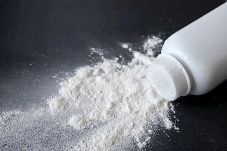 talcum powder pouring out of the container