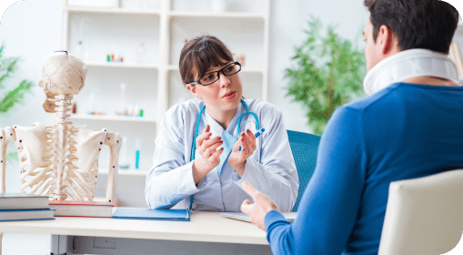 a person talking to a spine surgeon